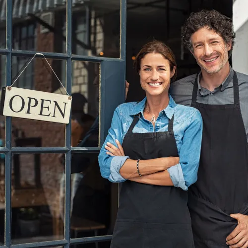 Business owner confidently managing cashflow with approved funding